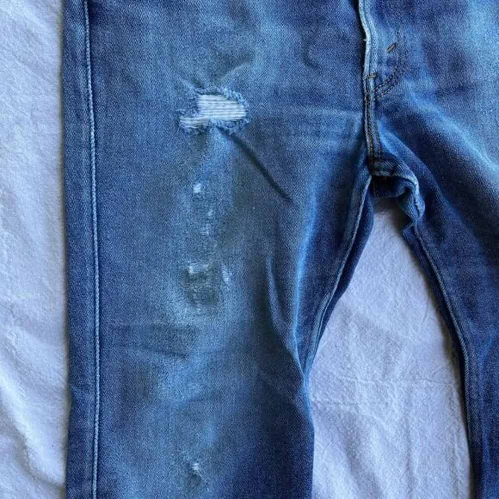 Vintage Distressed orange tab little‎ e Levis pants